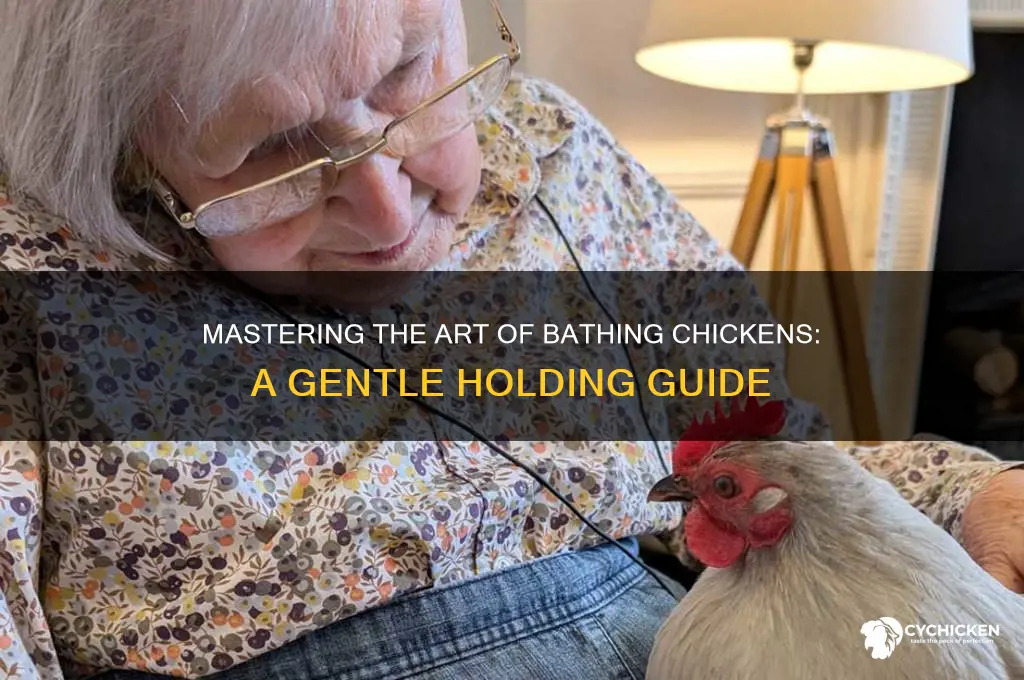 how to hold a chicken for a bath