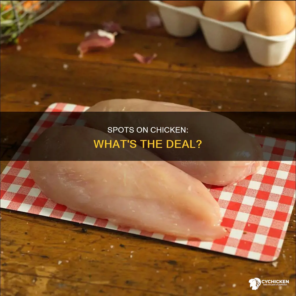 what are the white spots on my raw chicken
